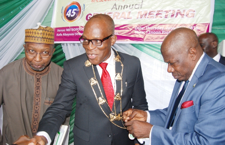 L-R: Commissioner for Insurance, Mr Mohammed Kari; Managing Director, Consolidated Hallmark Insurance Plc, Mr Eddie Efekoha, and Director General, Nigerian Insurance Association (NIA), Mr. Sunday Thomas, at the investiture of Mr. Efekoha as the new NIA Chairman during the 45th Annual General Meeting of NIA held in Lagos on Thursday 30:6:2016 (yesterday).