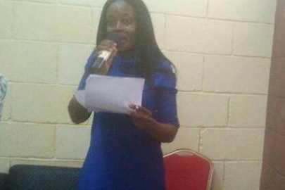 The author, Julie Omeike, at a reading session in Lagos.