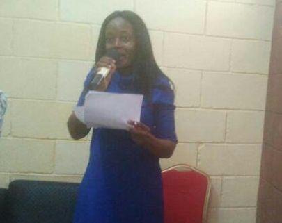 The author, Julie Omeike, at a reading session in Lagos.