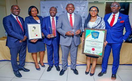 Harvest of Awards: L-R: Mr. Olayiwola Olabisi, Chief Financial Officer; Mrs. Eyoanwan, Head, Human Capital Management; Mr. Olasupo Sogelola; Executive Director, Technical & Operations; Mr. Jide Orimolade, MD/CEO; Mrs. Olufolake Afolabi, Chief Technical Officer; Mr. Steve Ajudua; Chief Marketing Officer Law Union & Rock Insurance Plc.