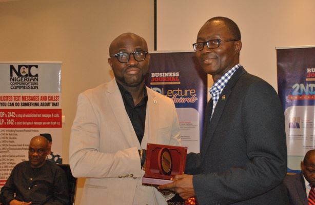 L-R: Mr. Segun Bankole, DGM, Sovereign Trust Insurance Plc receiving the ‘Most Innovative Insurance Retail Brand’ award on behalf of the company from Mr. Fatai Adegbenro, executive Secretary, NCRIB at the Business Journal 2nd Annual Lecture/awards in Lagos.